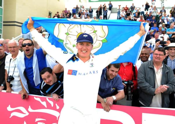 Yorkshire's Gary Ballance celebrates with the fans after winning the championship.