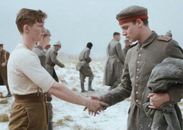 A still from Sainsbury's 2014 Christmas advert which recreates one of the most famous moments from the First World War