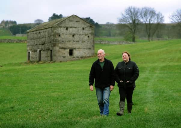Gillian Harrison with her father-in-law Maurice Harrison, in front of the barn they want to turn into an ice cream parlour