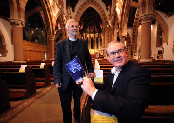 Former lawyer turned author, Nigel McClea is donating the proceeds of his new book 'A Word Glittering with Spikes' to Harrogate's St Peter's Church. Pictured with Rev Tony Shepherd.

Picture: Jonathan Gawthorpe