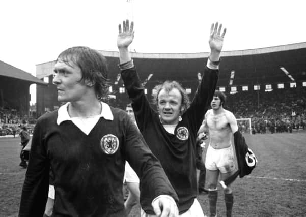 Davie Hay and captain Billy Bremner celebrating after the Scotland v England international at Hampden in May 1974.