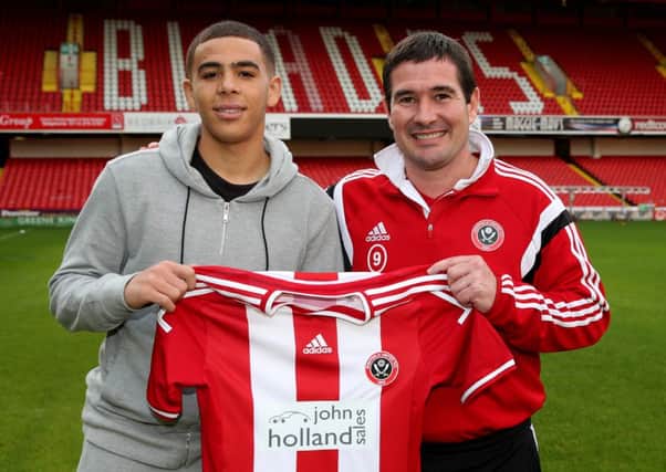 Sheffield United's new signing Che Adams with manager Nigel Clough.