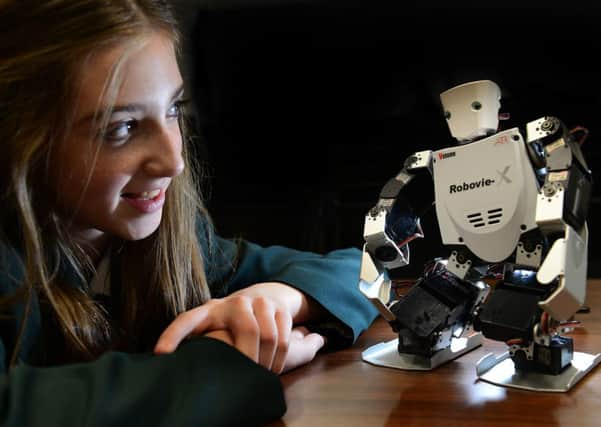 Molly Abbott from Horizon Community College in Barnsley with a RobovieX.
