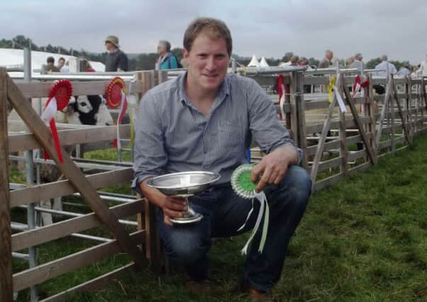 Mark Ewbank with his Swaledale sheep cup at Nidderdale Show. The trophy has been returned to organisers after 87 year-long absence.