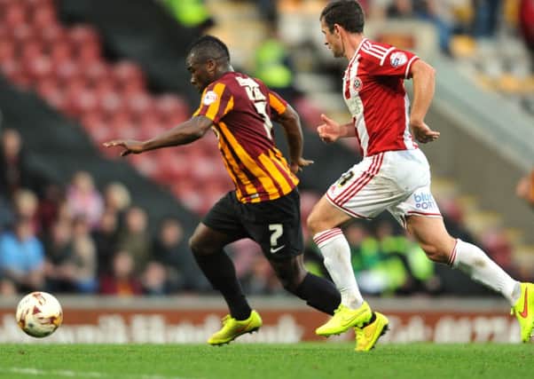Aaron Mclean in action for Bradford versus Sheffield United last month