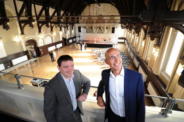 Unity Work's chief executive Mark Taylor and development director Chris Hill inside the main hall. Picture: Jonathan Gawthorpe.