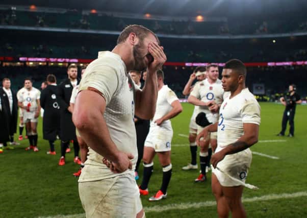 England's players show their disappointment after defeat to South Africa last weekend.