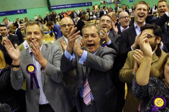 UKIP Leader Nigel Farage and supporters celebrate winning the Rochester and Strood by-election in Kent