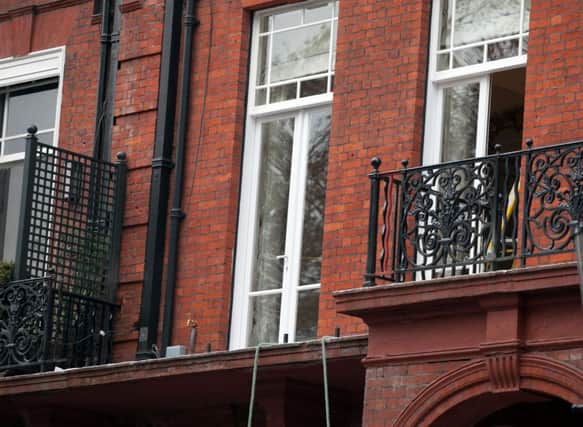 The scene in Cadogan Square, London, after a balcony collapsed killing two men and injuring at least six others.