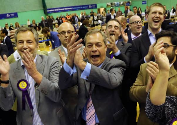 UKIP Leader Nigel Farage and supporters celebrate winning the Rochester and Strood by-election