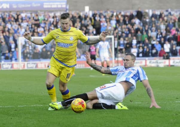 No penalty given as Town's Joel Lynch brings down Owls winger Chris Maguire