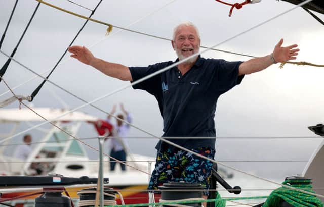 Grandfather-of-five Sir Robin Knox-Johnston has claimed third place in his class as he crossed the finishing line of a solo transatlantic race at the age of 75.