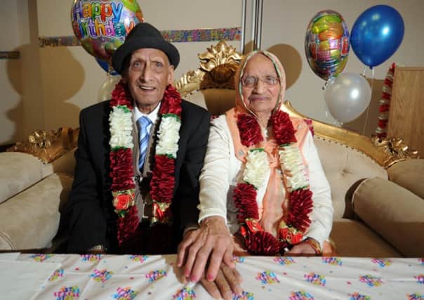 Britains oldest couple Karam Chand aged 109 and Mrs Kartari aged 102, at the Carlisle Business Centre, Bradford. Picture by Simon Hulme