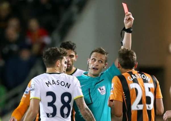 Hull City's Gaston Ramirez (right) is shown the red card by referee Craig Pawson
