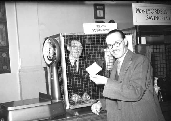 November 1956:  Mr C Fetrich buys a Premium Bond during the first day of sale