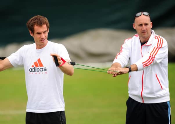 Great Britain's Andy Murray in practice session with his former fitness trainer Jez Green.