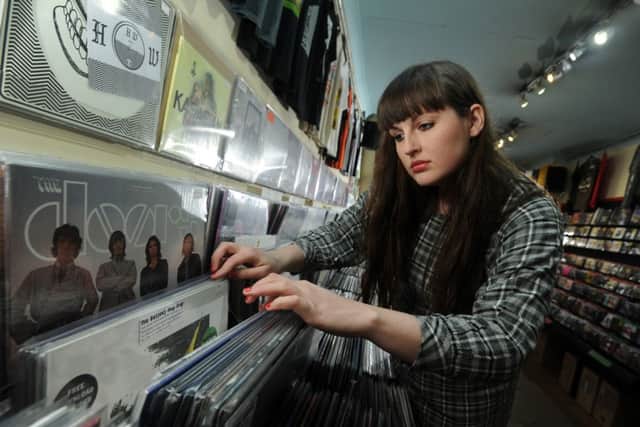 Melissa Watson checks out albums at Crash Records in Leeds. Picture by Bruce Rollinson.