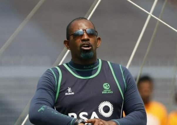 Phil Simmons, seen here working as Ireland's coach, had to have emergency surgery to remove a blood clot after being by a delivery bowled by David Lawrence.