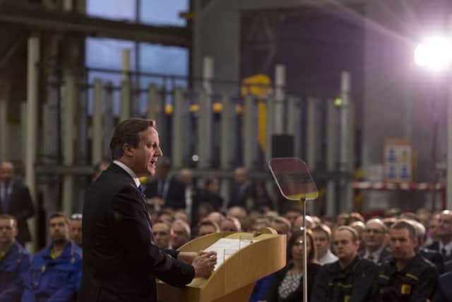 David Cameron delivers a speech on immigration to factory workers and members of the media at JCB World Headquarters in Rocester, Staffordshire.