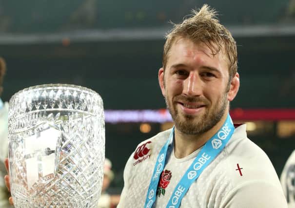 England captain, Chris Robshaw holds the Cook Cup after the QBE International match at Twickenham, London.