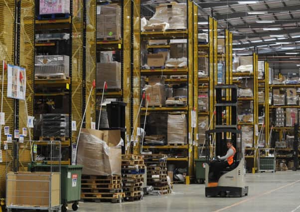 A worker at Amazon UK's warehouse in Doncaster