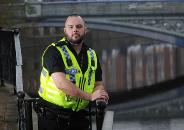 Lee Deighton by Leeds Bridge on the River Aire in Leeds, where he jumped in to save a woman. Picture by Simon Hulme