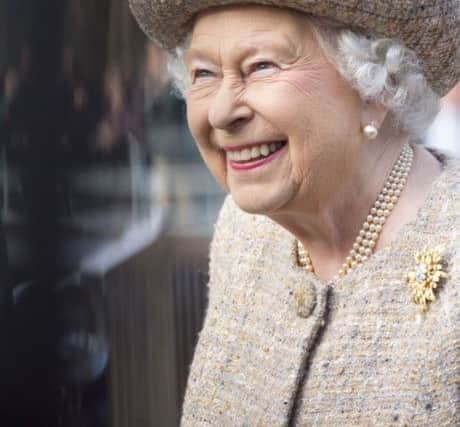 Queen Elizabeth II at Chapel Square, Wellington Barracks attending the dedication of the Flanders' Field Garden. PRESS ASSOCIATION Photo. Picture date: Thursday November 6, 2014. See PA story ROYAL Remembrance. Photo credit should read: Alex Lentati/Evening Standard/PA Wire