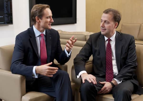 Aviva's group chief executive officer Mark Wilson (left) talking with Friends Life chief executive Andy Briggs.