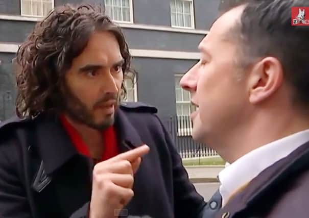 Russell Brand losing his cool with Channel 4 News reporter Paraic O'Brien in Downing Street when he was asked how much he pays to rent his home