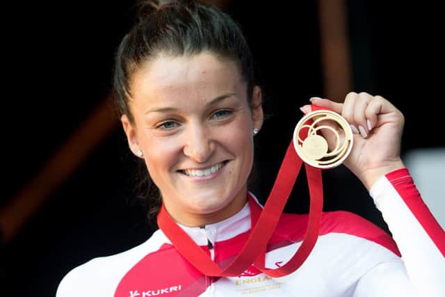 England's Lizzie Armitstead celebrates Gold in the road race at Glasgow Green, during the 2014 Commonwealth Games in Glasgow.
