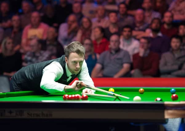 Judd Trump on his way to victory against Mark Davis.