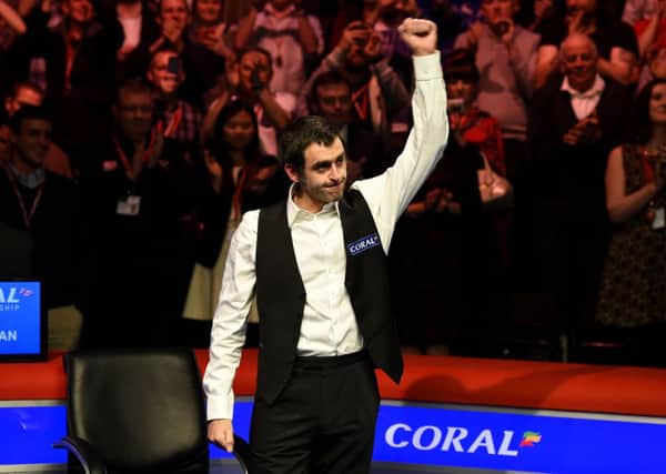Ronnie O'Sullivan celebrates winning the 2014 Coral UK Championship at the Barbican Centre, York.