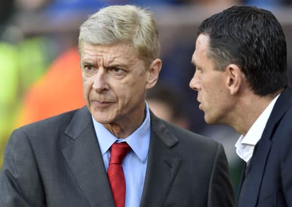 Arsenal manager Arsene Wenger, left, and Sunderland manager Gus Poyet.