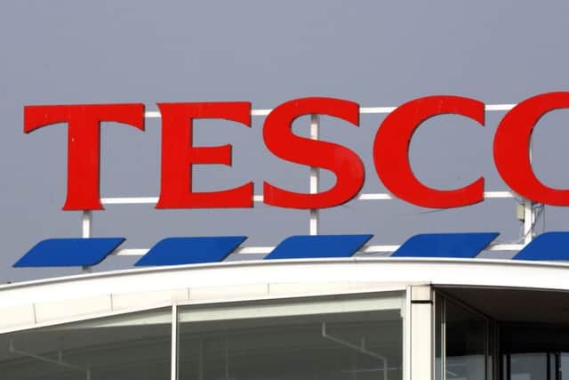 Tesco downgraded its guidance to the City on profits for the 2014/15 financial year.