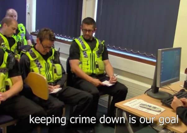 A grab from video released by West Yorkshire Police of thier spooh hit of kids hit musical Frozen.