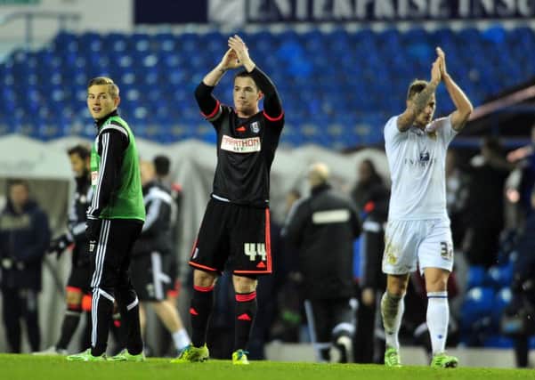 HELLO AGAIN: Former Leeds favourite Ross McCormack acknowleges the crowd at Elland Road. Picture:Tony Johnson