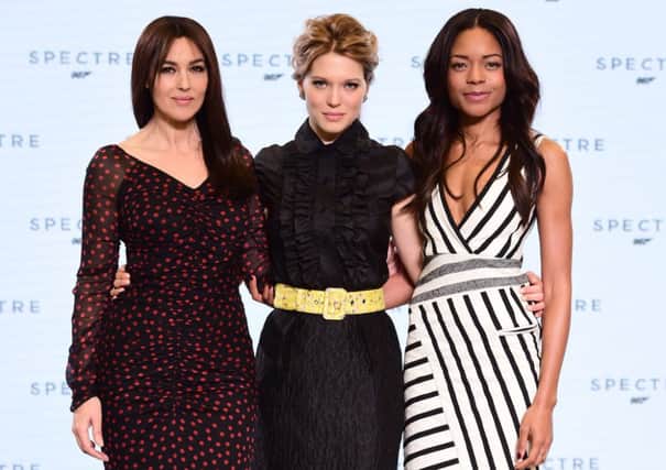 (left to right) Monica Bellucci, Lea Seydoux and Naomie Harris, who will feature in the new James Bond film. Picture: Ian West/PA Wire