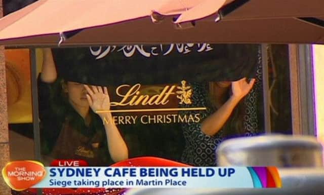 The scene at the cafe under siege at Martin Place in Sydney