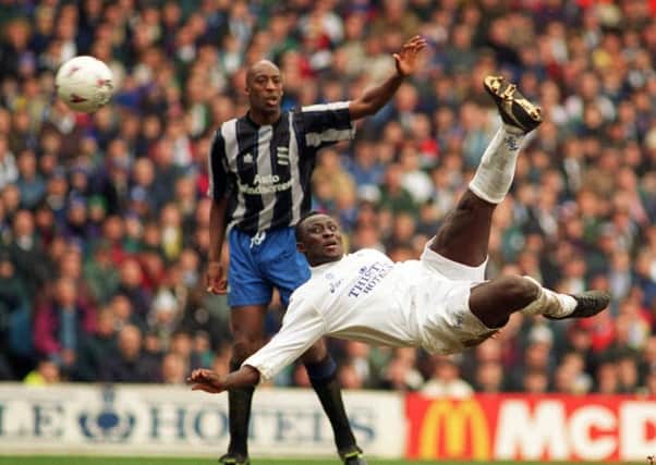 Tony Yeboah fires Leeds into a 2-0 lead with an overhead kick as Birmingham's ex Leeds United defender Chris Whyte watches.