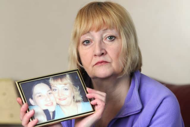 Linda Umpleby with a picture of her daughter Gemma Simpson