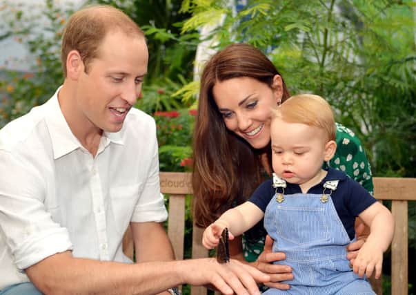 The Duke and Duchess of Cambridge and Prince George. See Royal Question 3