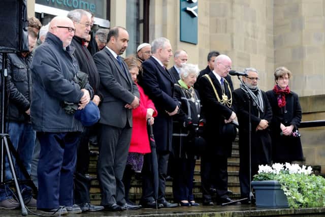 The Lord Mayor of Leeds, Councillor David Congreve leads a minute's silence outside Leeds Art Galley in memory of the victims of Pakistan Taliban massacre