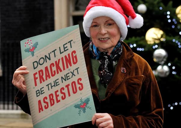 Vivienne Westwood delivers an asbestos Christmas card for David Cameron at 10 Downing Street