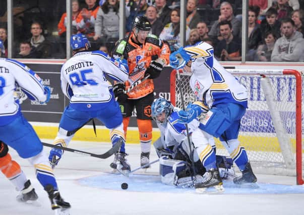 Mike Forney causes a nuisance around the Hull net during Saturday's 5-2 win over their Yorkshire rivals. Picture: Dean Woolley.