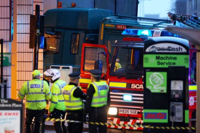 Emergency services at the scene on Queen Street in Glasgow. Pictures: SWNS