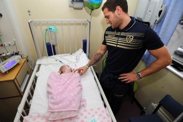 Billy Sharp meets Millie Stansfield, aged 4 months