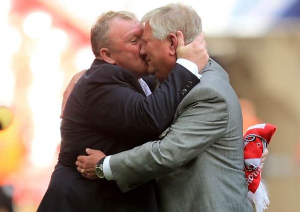 Rotherham United manager Steve Evans celebrates with chairman Tony Stewart after victory in last Mays League One play-off final (Picture: Mike Egerton/PA Wire).