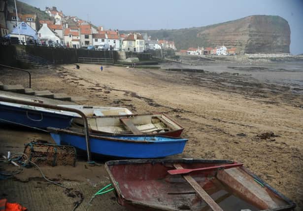 Picturesque bay: Staithes has long been a magnet for artists who take inspiration from the coastline. Picture: Gerard Binks