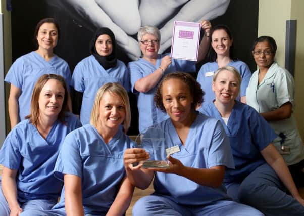 Staff from the labour ward at Bradford Royal Infirmary collect the award for their work. PIC: Lorne Campbell/Guzelian