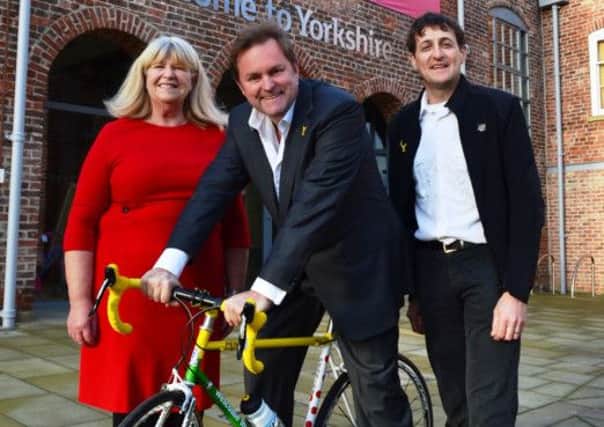 Sandra Corcoran of Pennine Cycle with husband Paul, right, and Gary Verity.